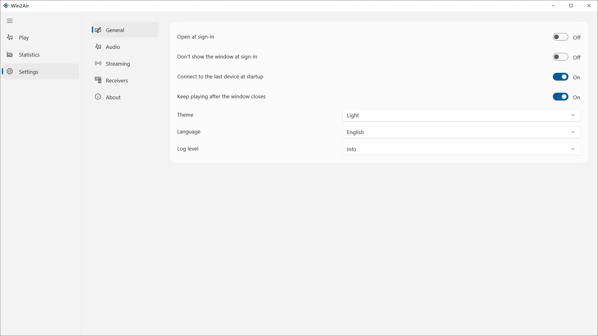 Win2Air settings with startup, theme, and language options
